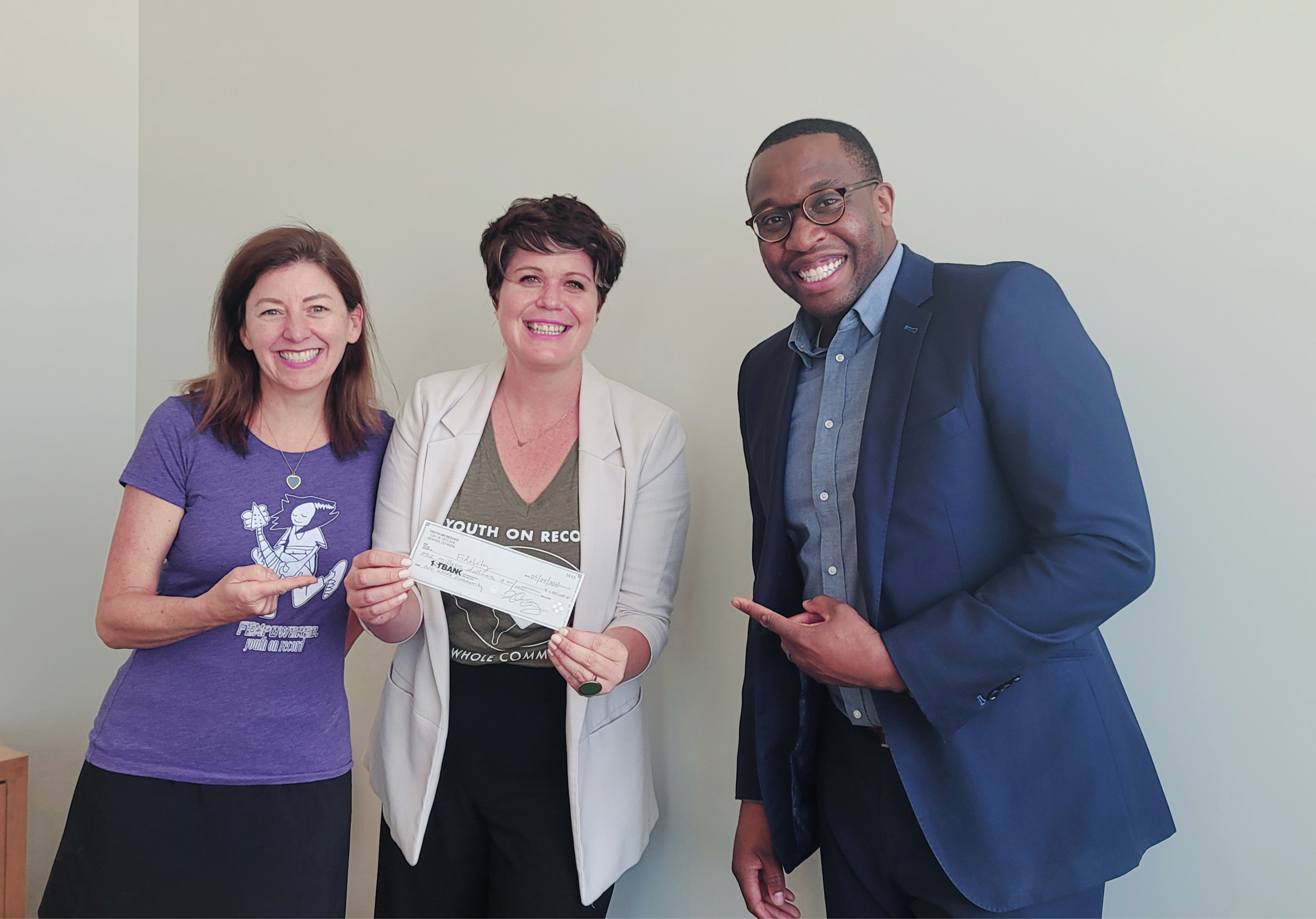 Shiela Enser (Board President) Jami Duffy (Executive Director) and Abiye Okuchaba (Fidelity Bank)