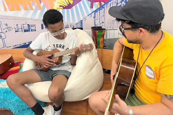 Caleb teaches guitar