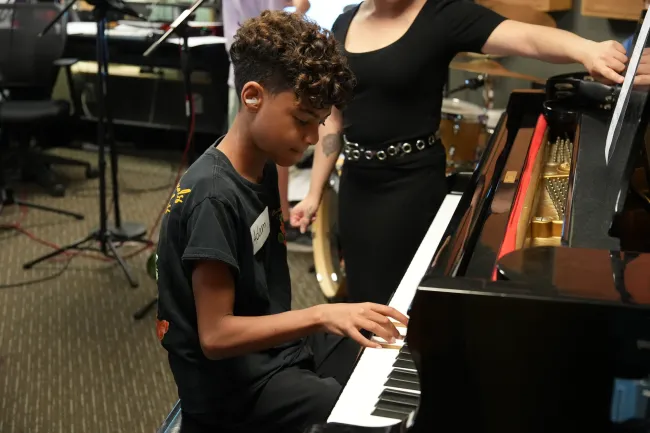 student playing piano