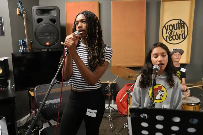 students singing