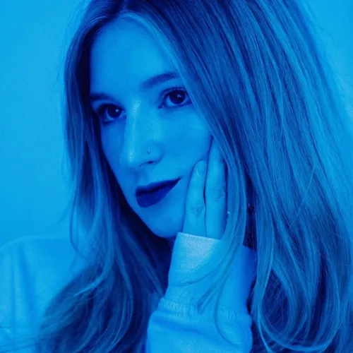 Katrina Leibee headshot with blue filter